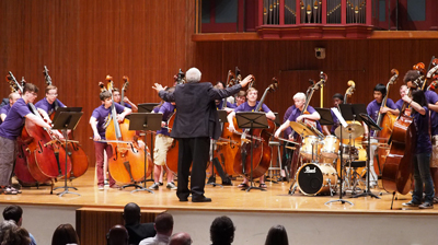 Student bass orchestra conducted by Rufus Reid